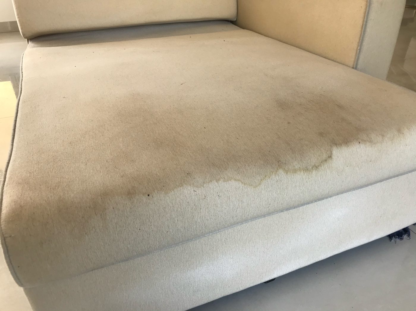 The same sofa before cleaning